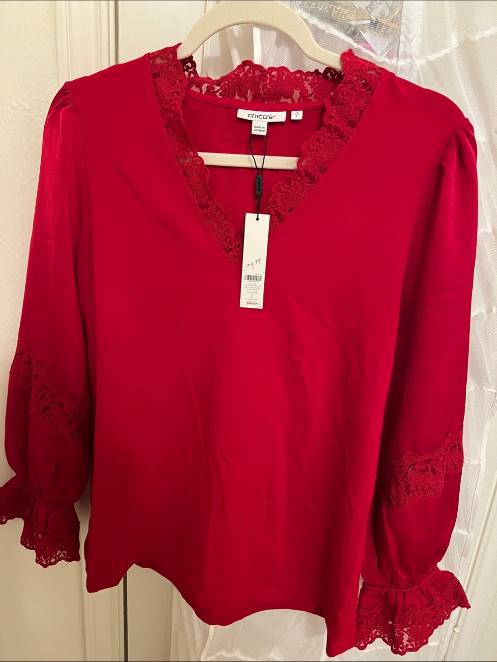 Chico's Cherry Red Lace-Trim V-Neck Long Sleeve Blouse with Lace detailing.